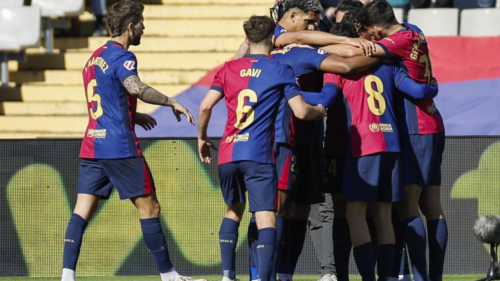 Los futbolistas del Barça celebran un gol al Girona