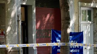 Portal de la calle Consell de Cent, 200, donde una persona ha sido asesinada a tiros