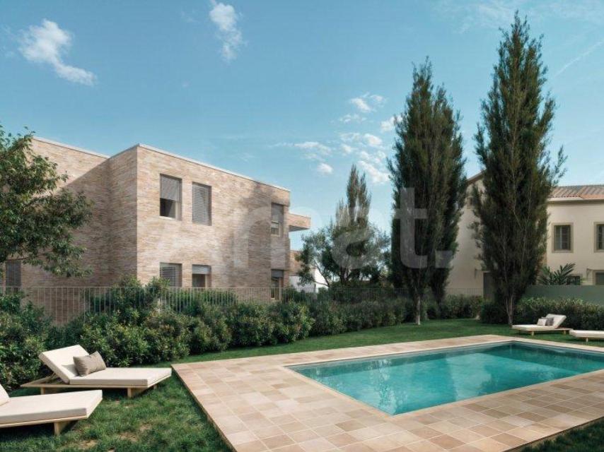 Jardín comunitario y piscina del complejo residencial Torre de l’Hereu, en Sant Just Desvern