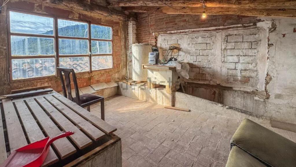 Habitación de una casa en venta