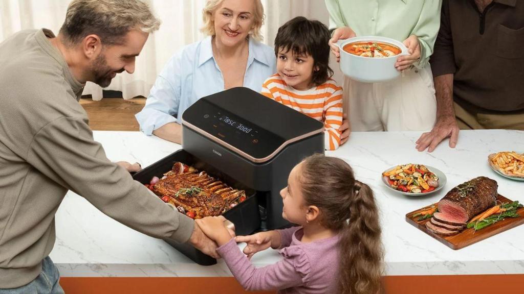 Una familia cocina en la freidora de aire
