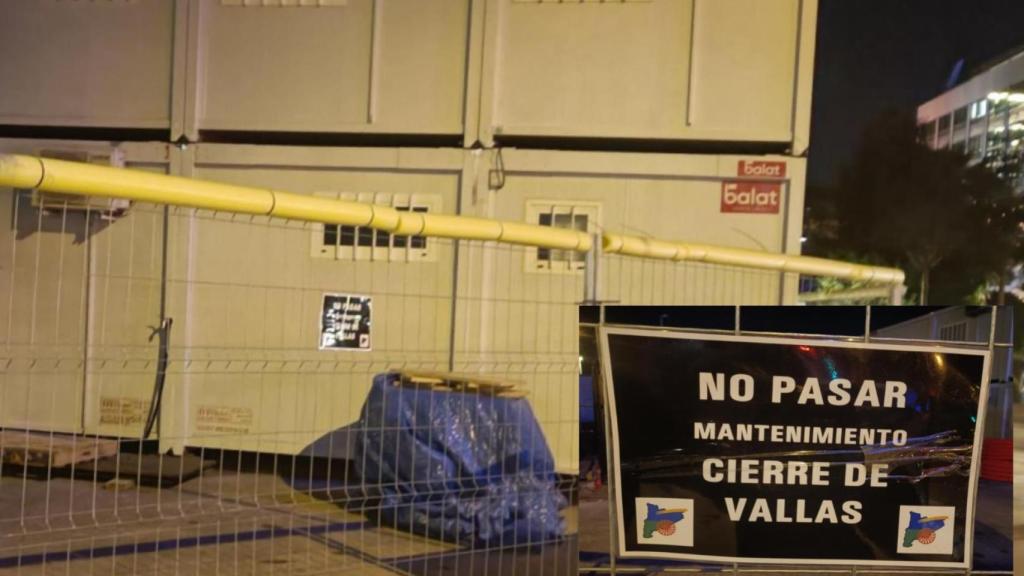 Obras en Barcelona con cartel de seguridad con simbología romaní